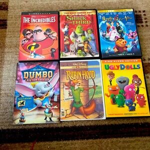 Lot of 6 dvds movies, Sherk Third, Ugly Dools, Dumbo, Happpily Never After,